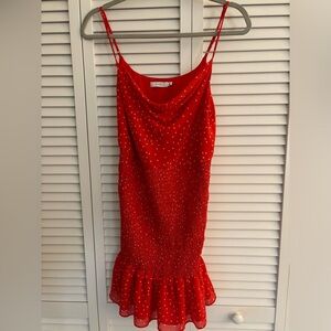 Cowl neck, fitted dress with ruffle bottom